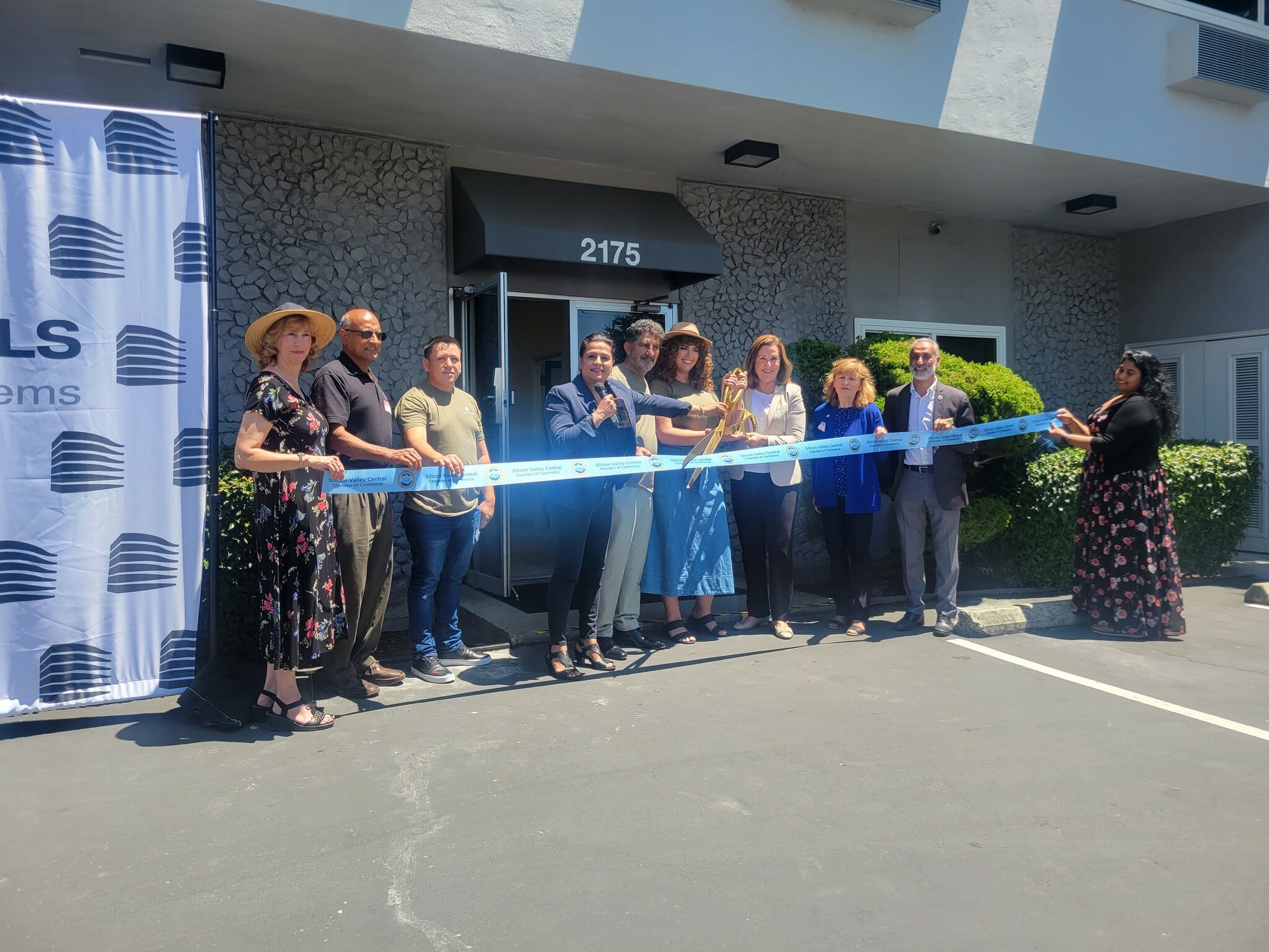 The Chamber ribbon held out straight before the cut at TriCore